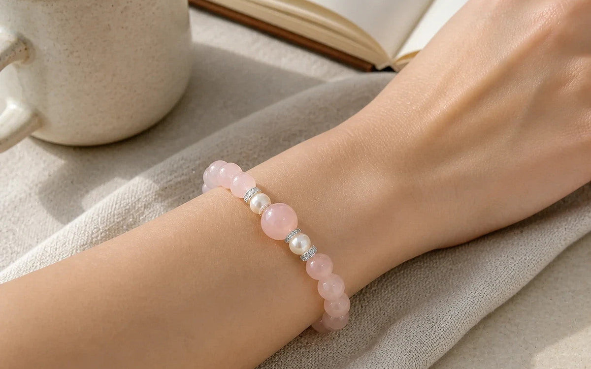 Love Ritual Bracelet worn at the wrist on soft linen