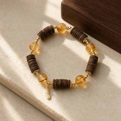 Amber-tone and dark wood bracelet in warm window light