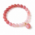 Pink gradient bead bracelet with a persimmon-shaped dangle