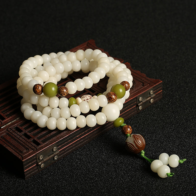 Rooted Stillness Bodhi Mala styled in a warm everyday scene